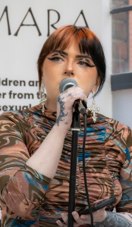 photo of little tiggs singing 